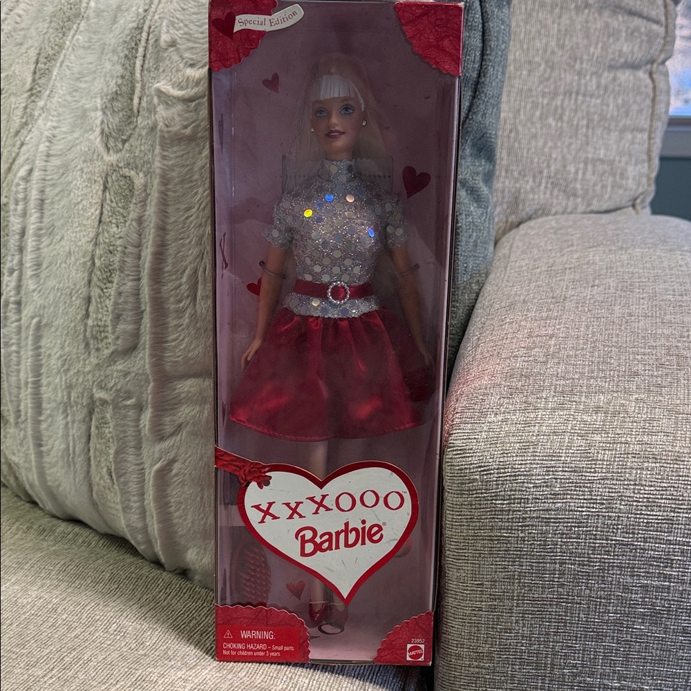 Vintage 1999 Barbie Special Edition Doll with Silver Top and Red Skirt.